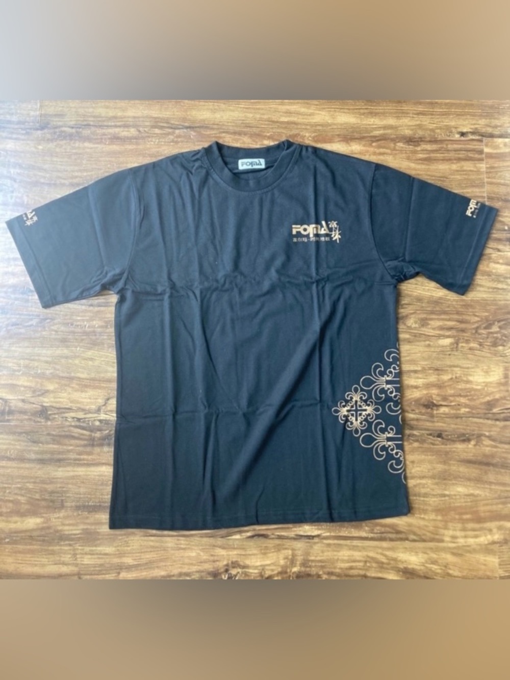 Black Short-Sleeve Graphic Tee with Gold Accents